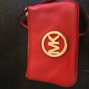 Michael Kors orange clutch